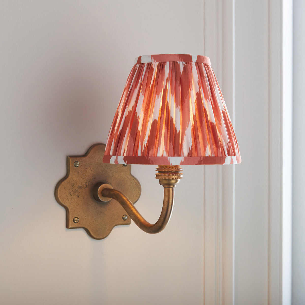 Anvil Curve Wall Light in Brass with Apricot Orange 16cm Zigzag Shade