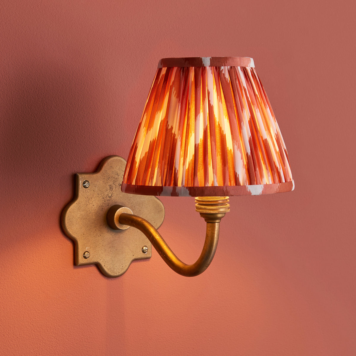 Anvil Curve Wall Light in Brass with Apricot Orange 16cm Zigzag Shade