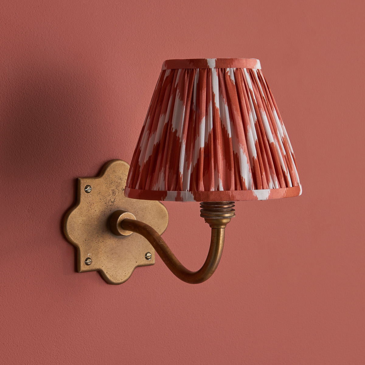 Anvil Curve Wall Light in Brass with Apricot Orange 16cm Zigzag Shade