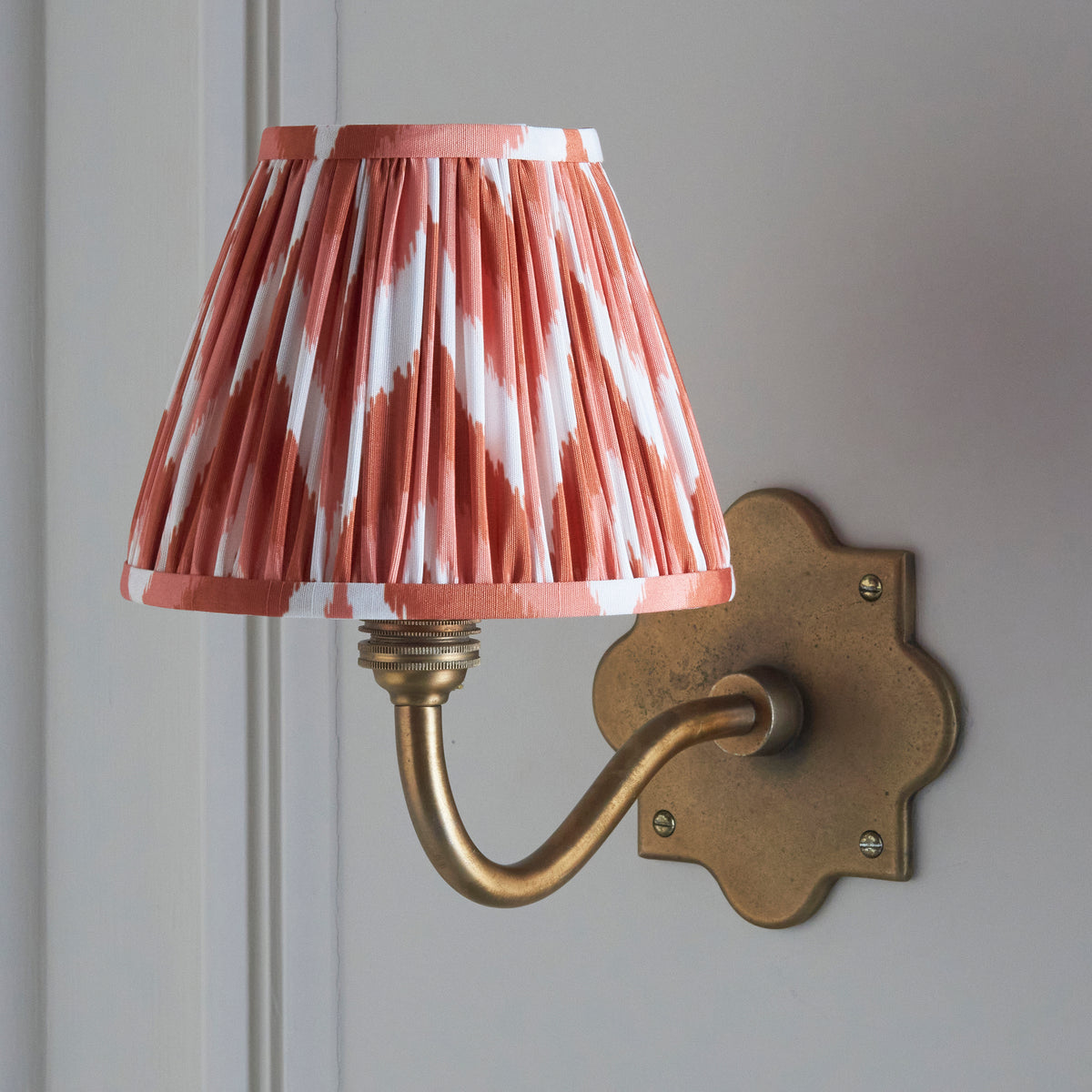 Anvil Curve Wall Light in Brass with Apricot Orange 16cm Zigzag Shade