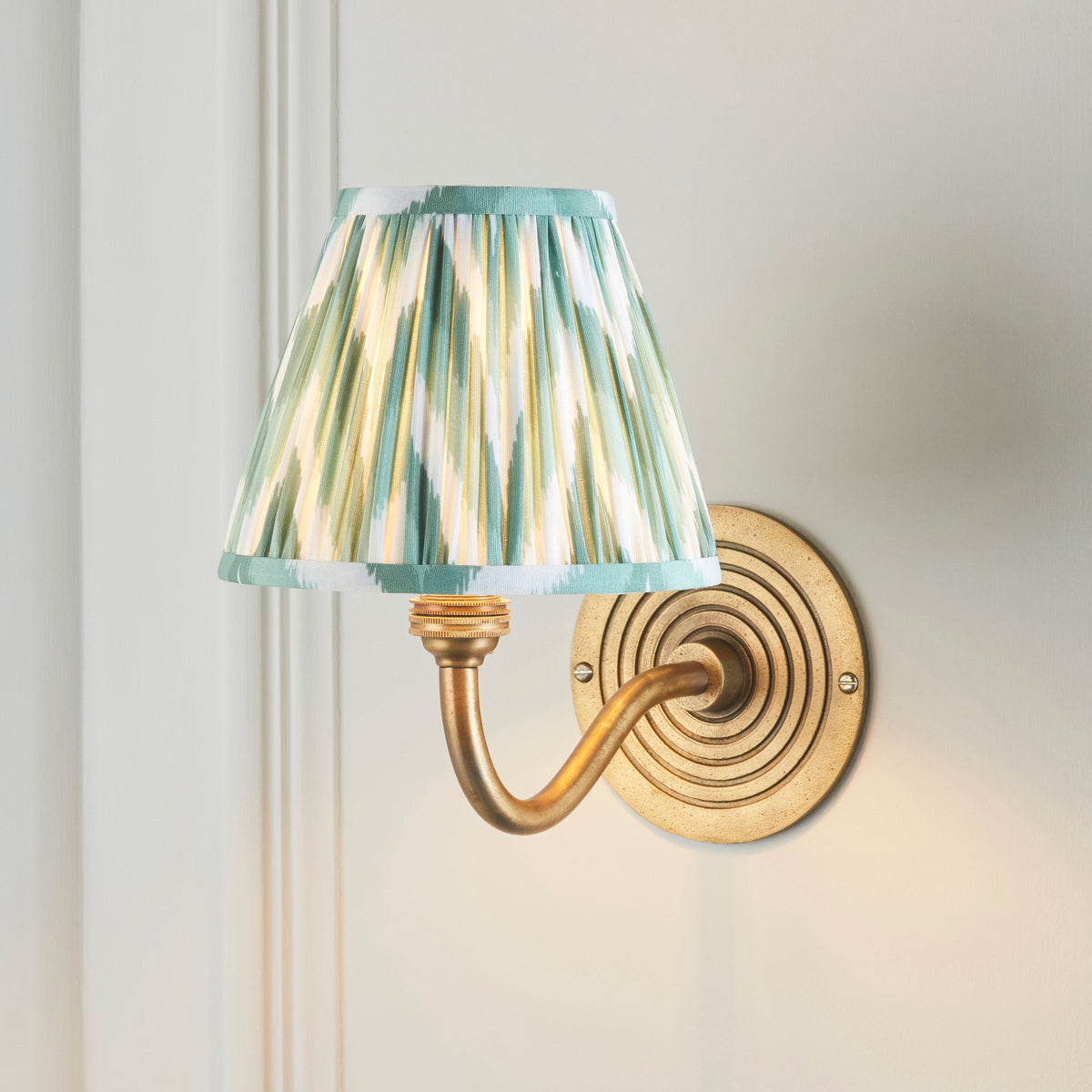 Ripple Curve Wall Light in Brass with Cotswold Green 16cm Zigzag Shade