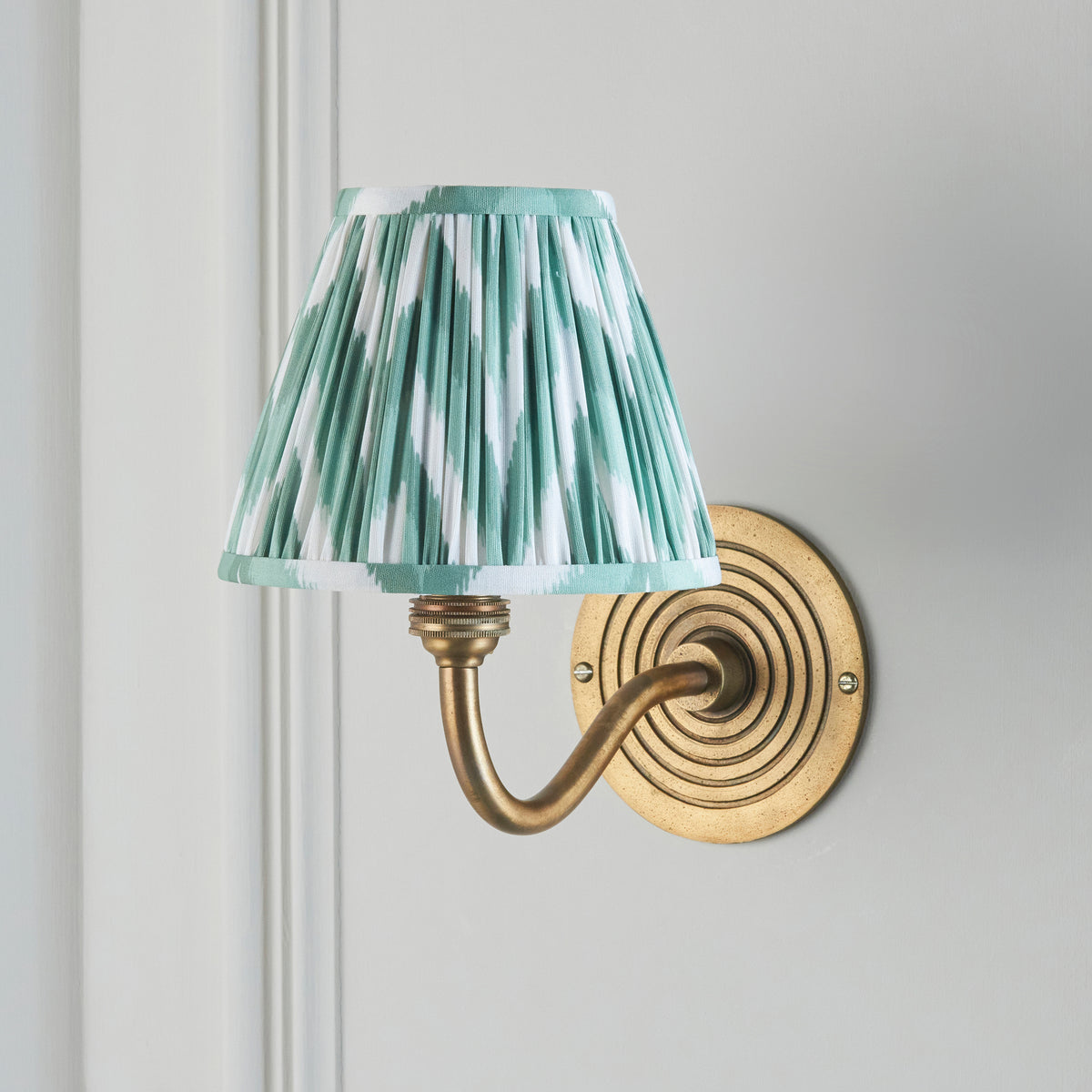 Ripple Curve Wall Light in Brass with Cotswold Green 16cm Zigzag Shade