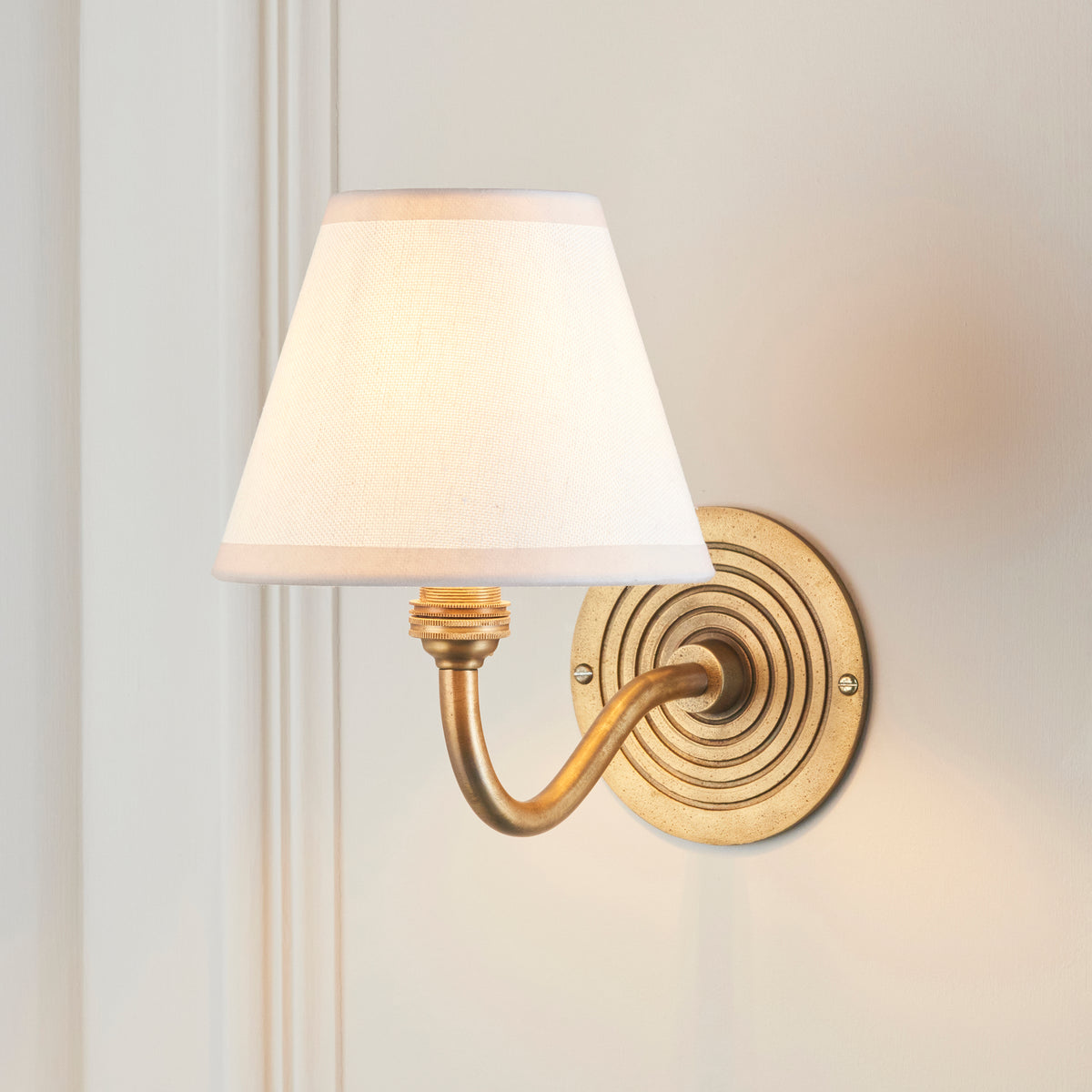 Ripple Curve Wall Light in Brass with Vintage & Almond White 16cm Ivy Shade