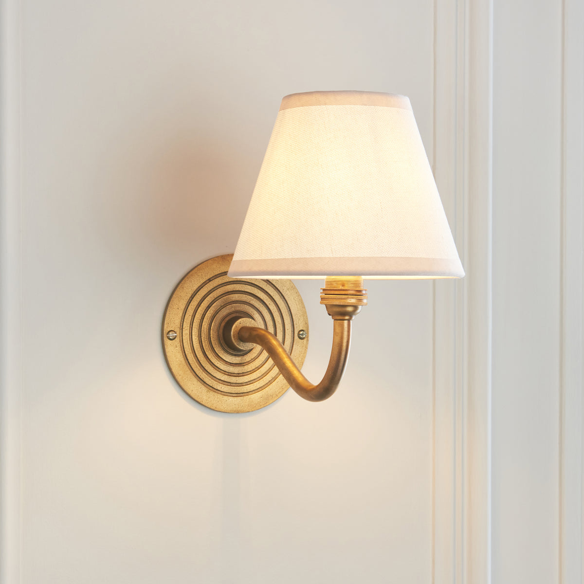 Ripple Curve Wall Light in Brass with Vintage & Almond White 16cm Ivy Shade
