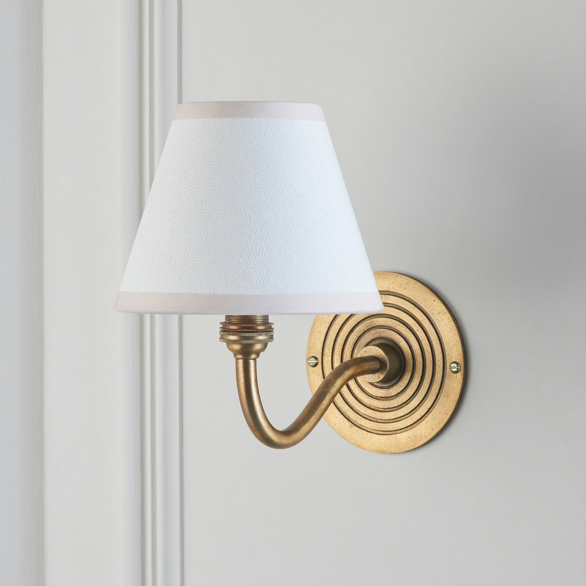 Ripple Curve Wall Light in Brass with Vintage & Almond White 16cm Ivy Shade