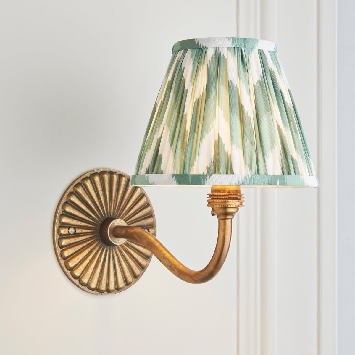 Dahlia Curve Wall Light in Brass with Cotswold Green 16cm Zigzag Shade
