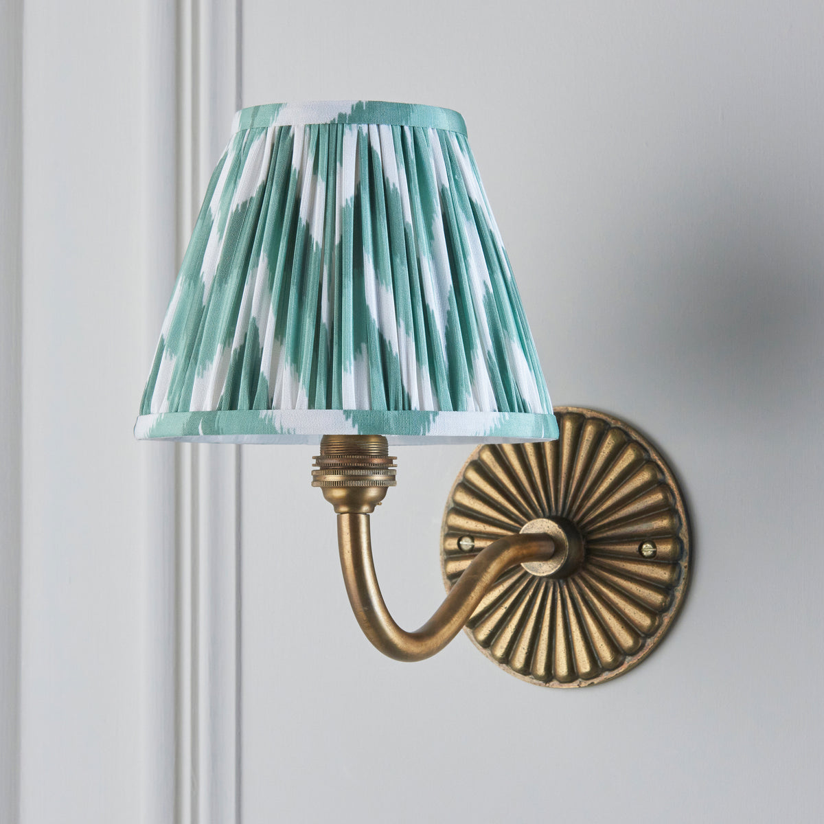 Dahlia Curve Wall Light in Brass with Cotswold Green 16cm Zigzag Shade