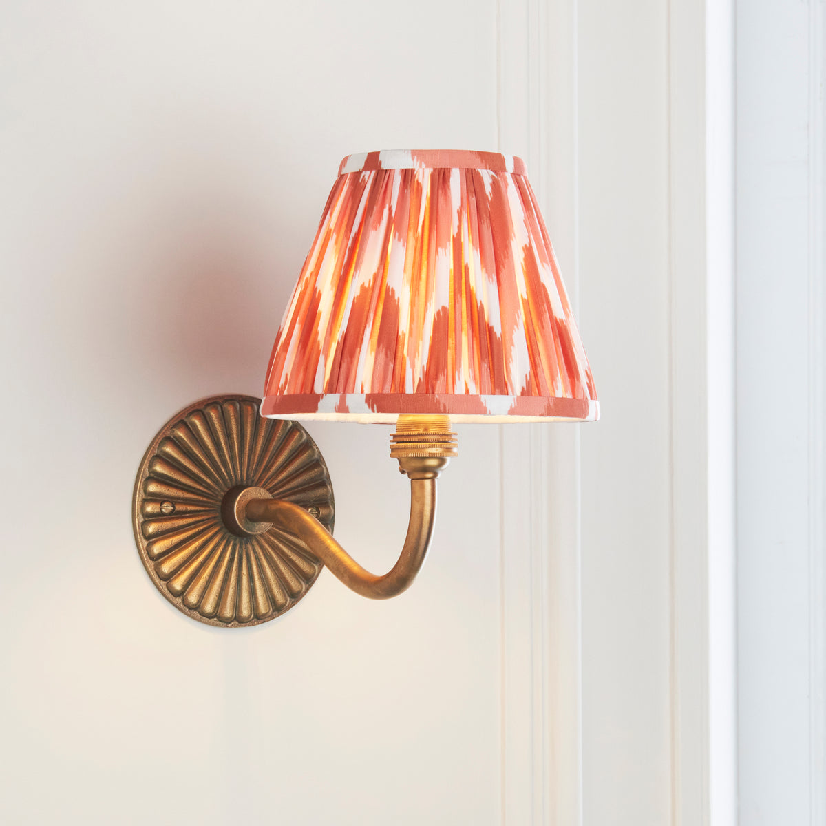 Dahlia Curve Wall Light in Brass with Apricot Orange 16cm Zigzag Shade