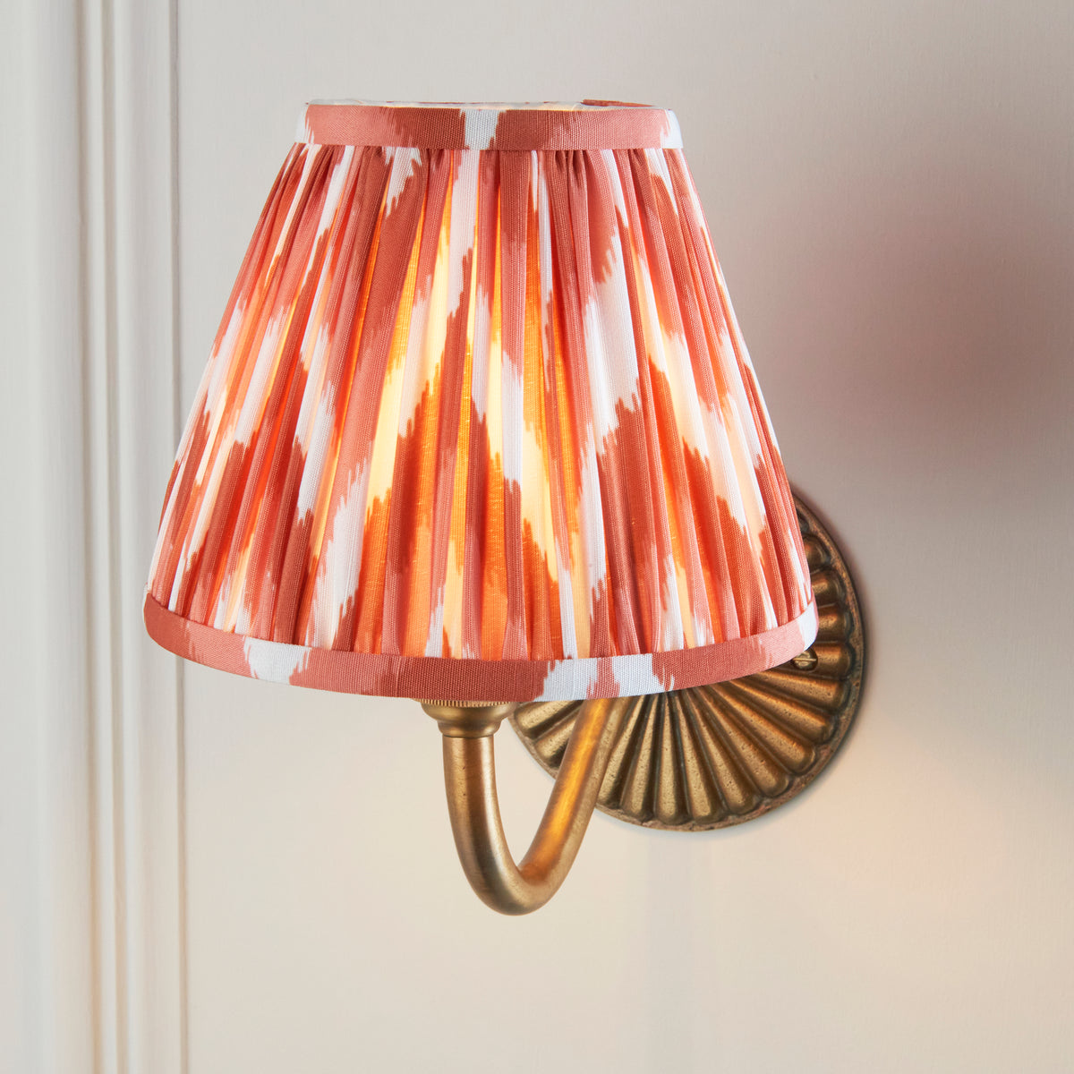 Dahlia Curve Wall Light in Brass with Apricot Orange 16cm Zigzag Shade