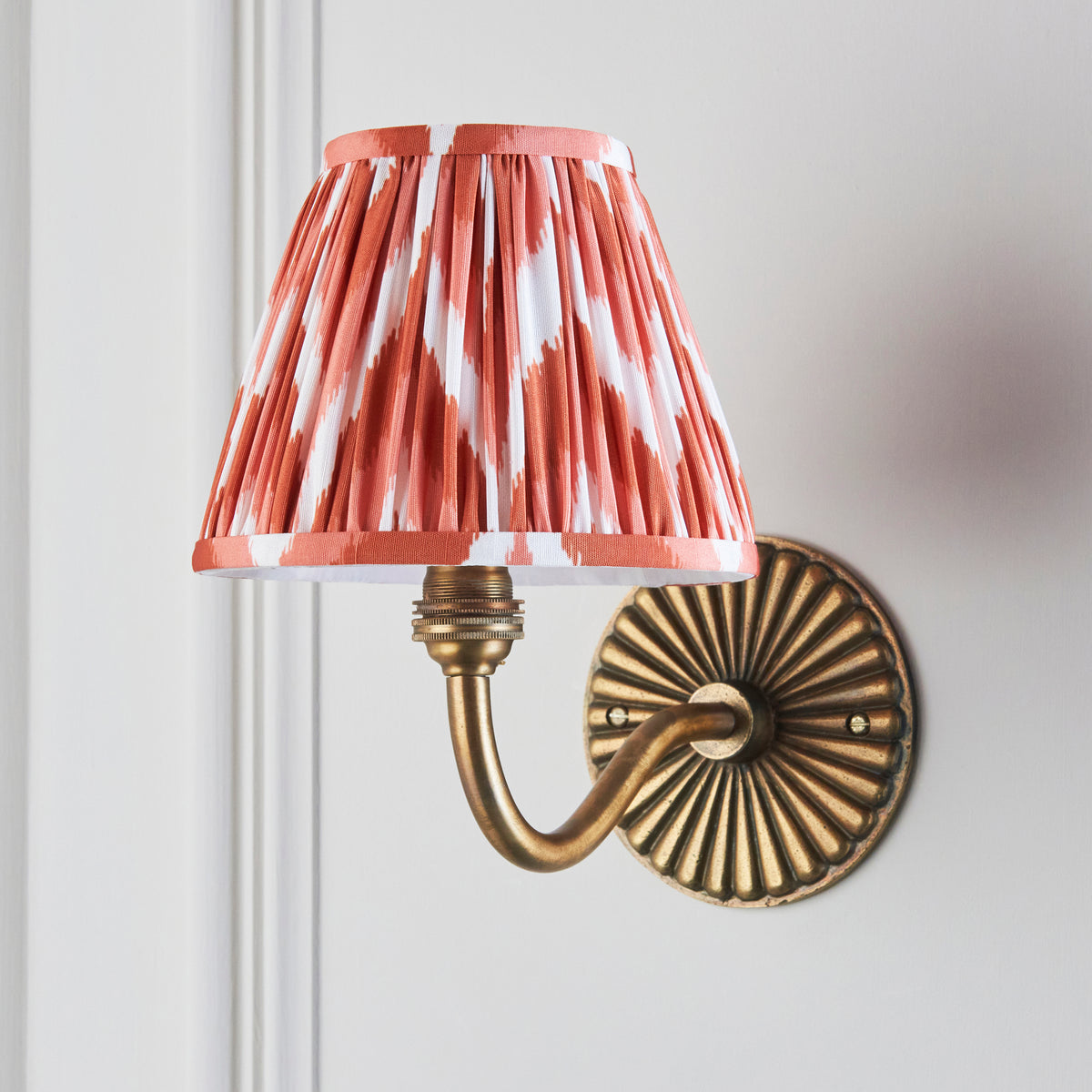 Dahlia Curve Wall Light in Brass with Apricot Orange 16cm Zigzag Shade