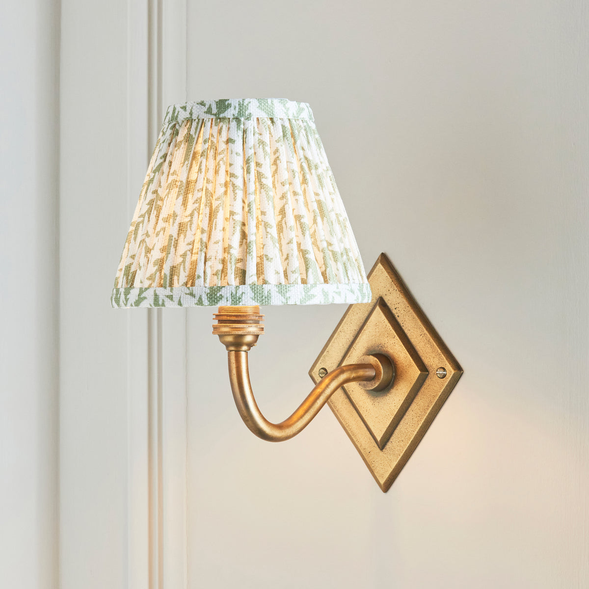 Diamond Curve Wall Light in Brass with Herb Garden Green 16cm Leaf Shade