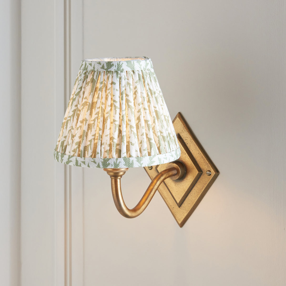 Diamond Curve Wall Light in Brass with Herb Garden Green 16cm Leaf Shade
