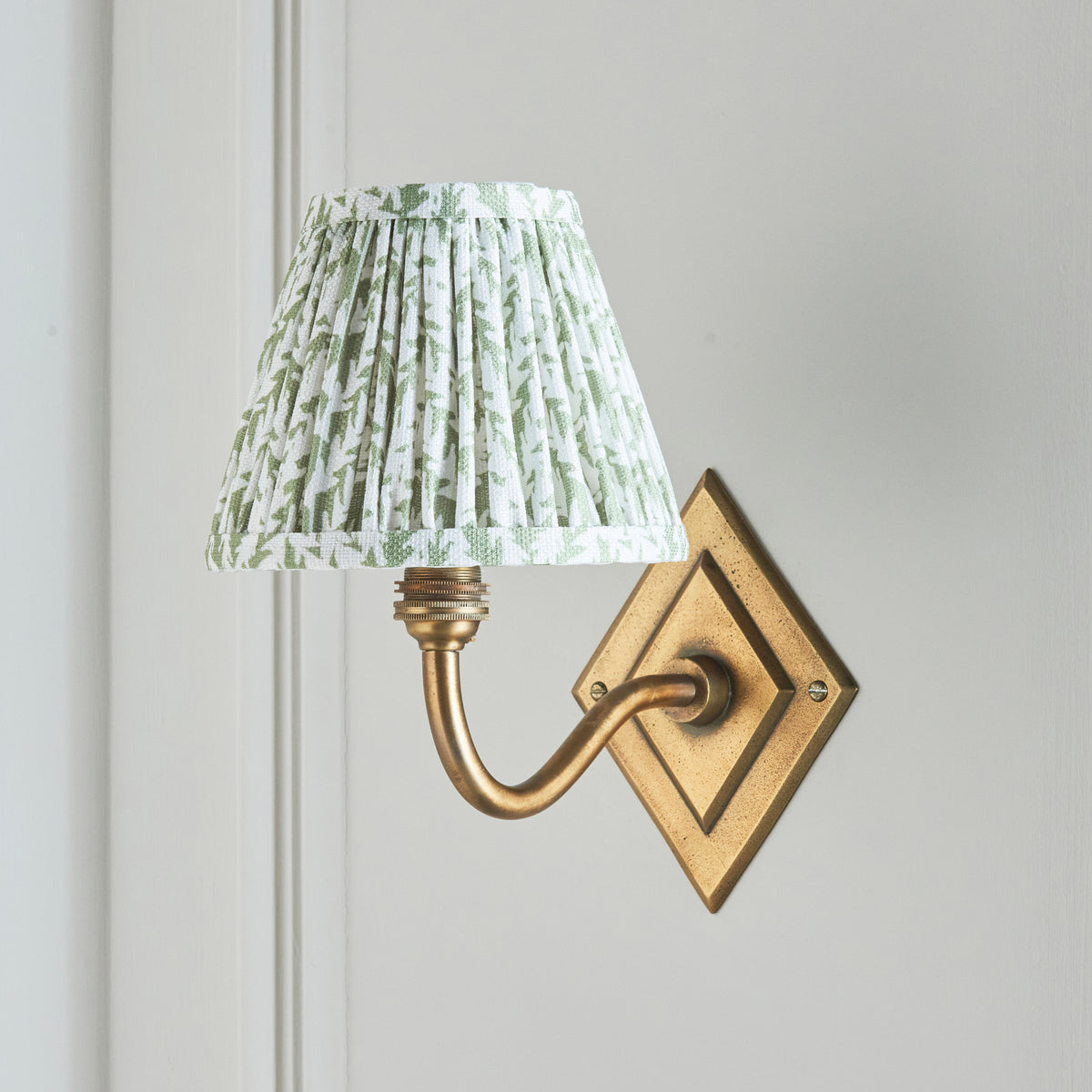 Diamond Curve Wall Light in Brass with Herb Garden Green 16cm Leaf Shade