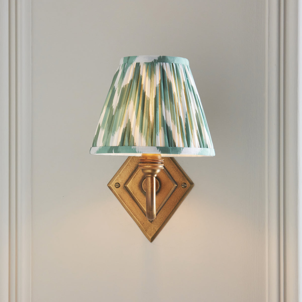 Diamond Curve Wall Light in Brass with Cotswold Green 16cm Zigzag Shade