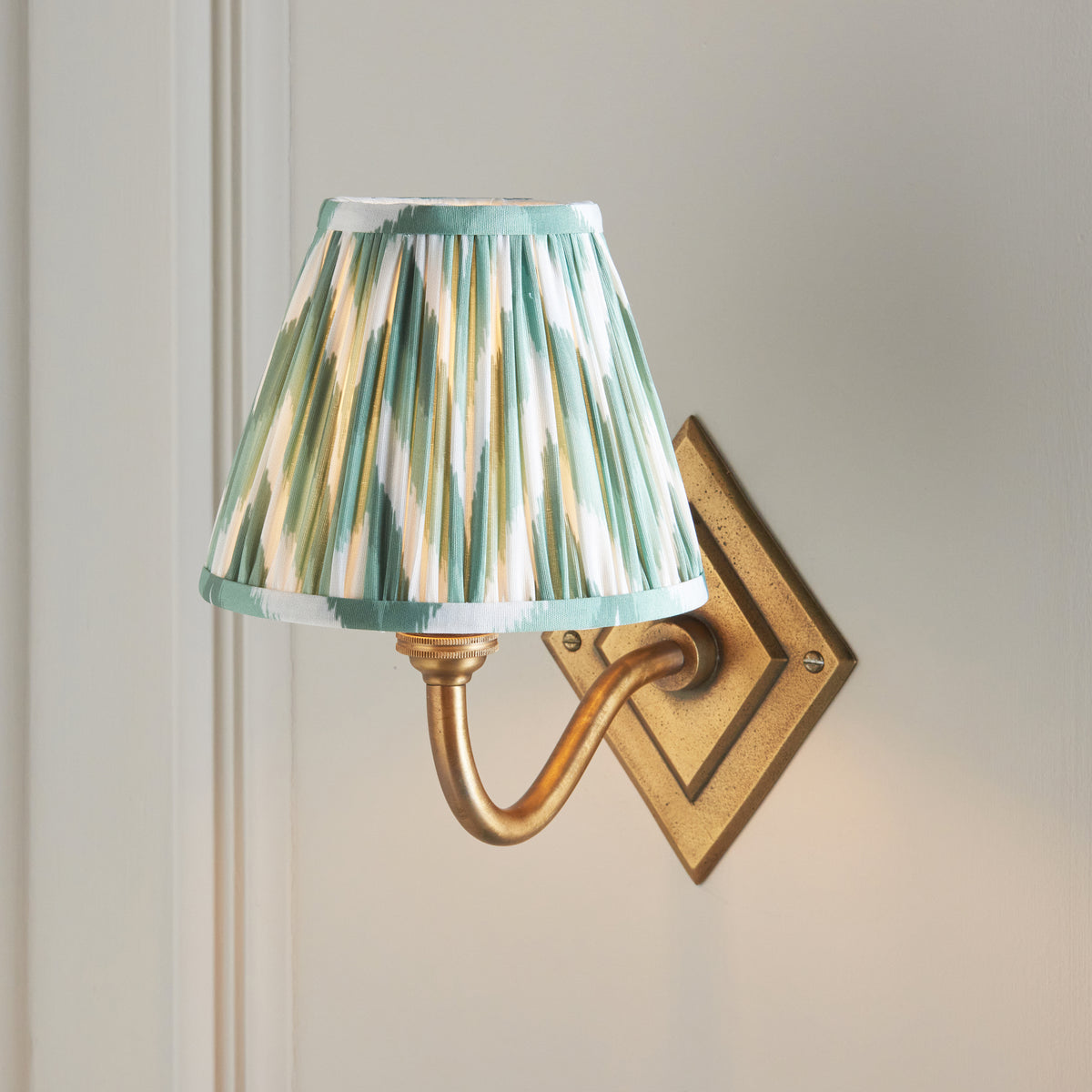 Diamond Curve Wall Light in Brass with Cotswold Green 16cm Zigzag Shade