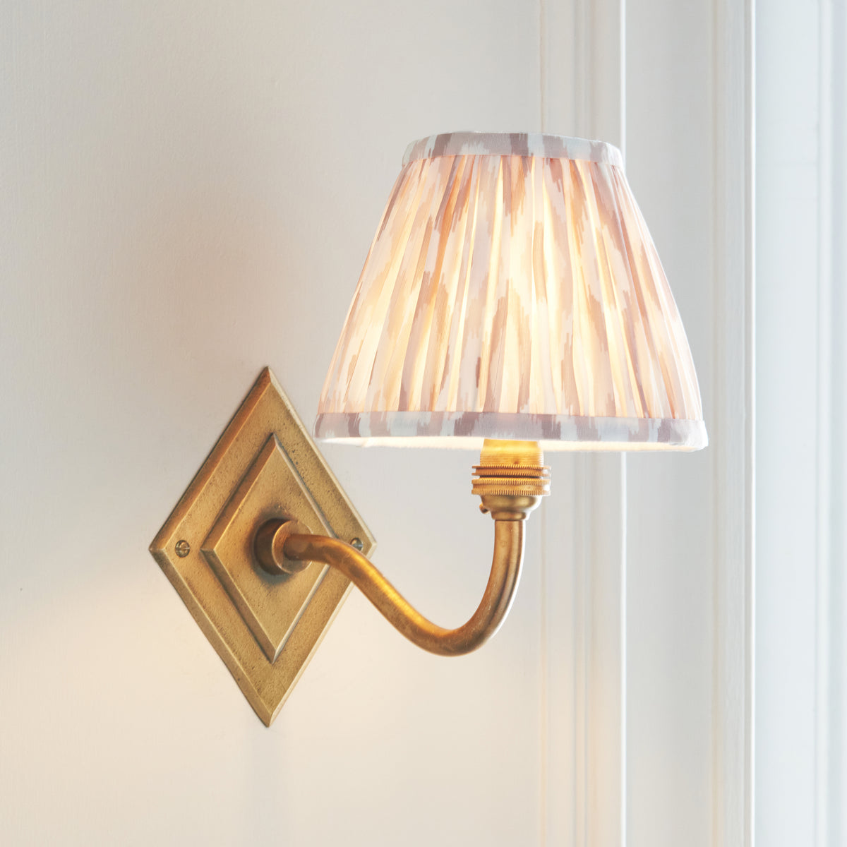 Diamond Curve Wall Light in Brass with Neutral 16cm Ikat Shade