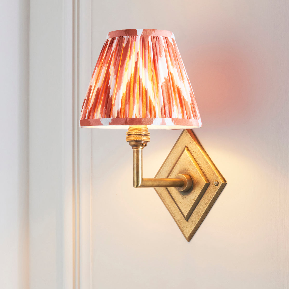 Diamond Angle Wall Light in Brass with Apricot Orange 16cm Zigzag Shade