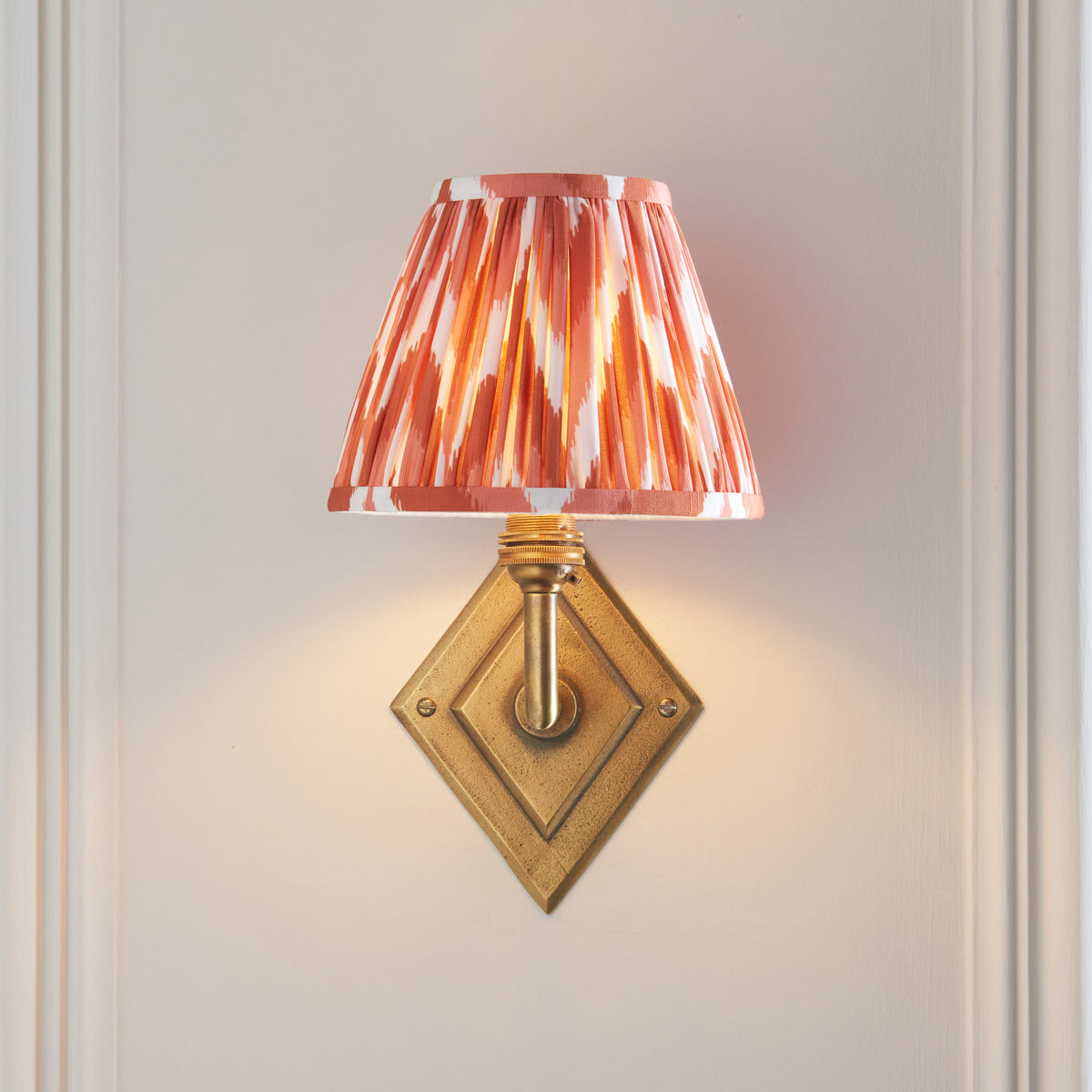 Diamond Angle Wall Light in Brass with Apricot Orange 16cm Zigzag Shade