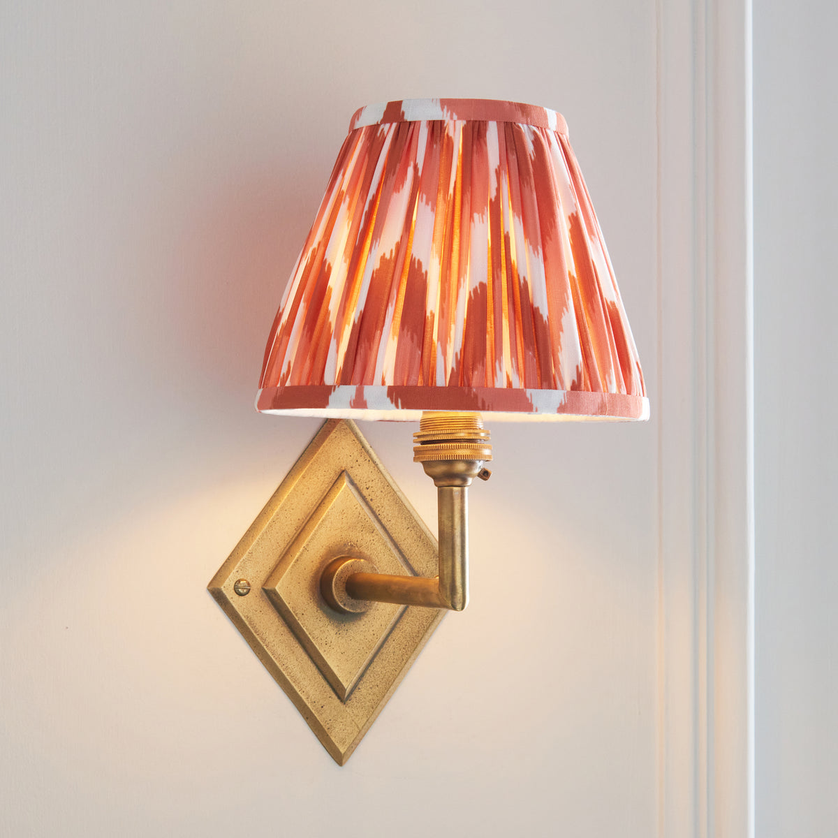 Diamond Angle Wall Light in Brass with Apricot Orange 16cm Zigzag Shade