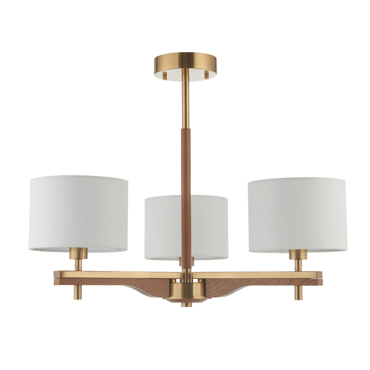 Modern brass chandelier with three white fabric shades and a wooden accent bar.