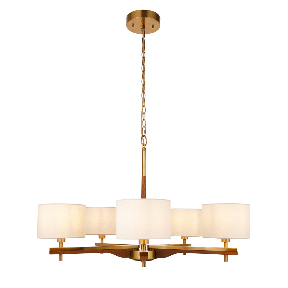 A modern chandelier with a gold chain, five white drum shades, and a wooden base.