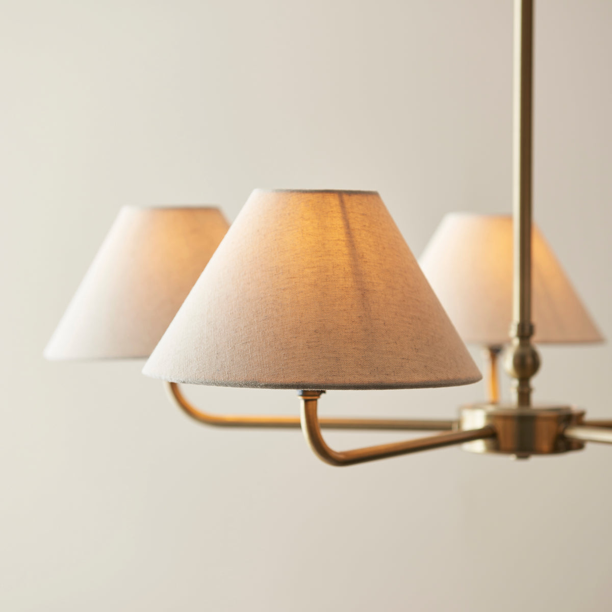 Lille Five Arm Pendant in Antique Brass with Tapered Natural Linen Shades