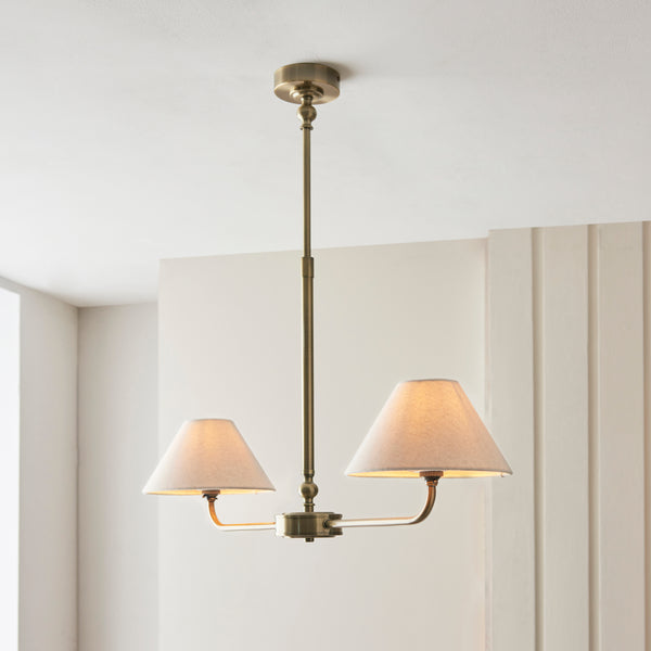 Lille Twin Light Linear Pendant in Antique Brass with Tapered Natural Linen Shades