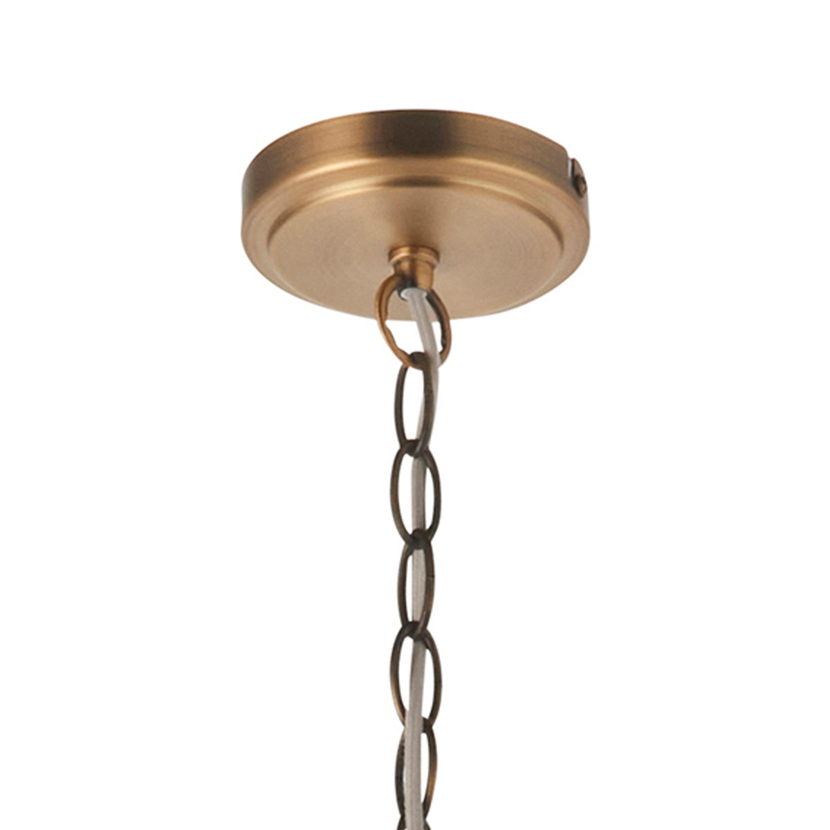 Close-up of a bronze ceiling rose with a chain and electrical wire hanging from it.