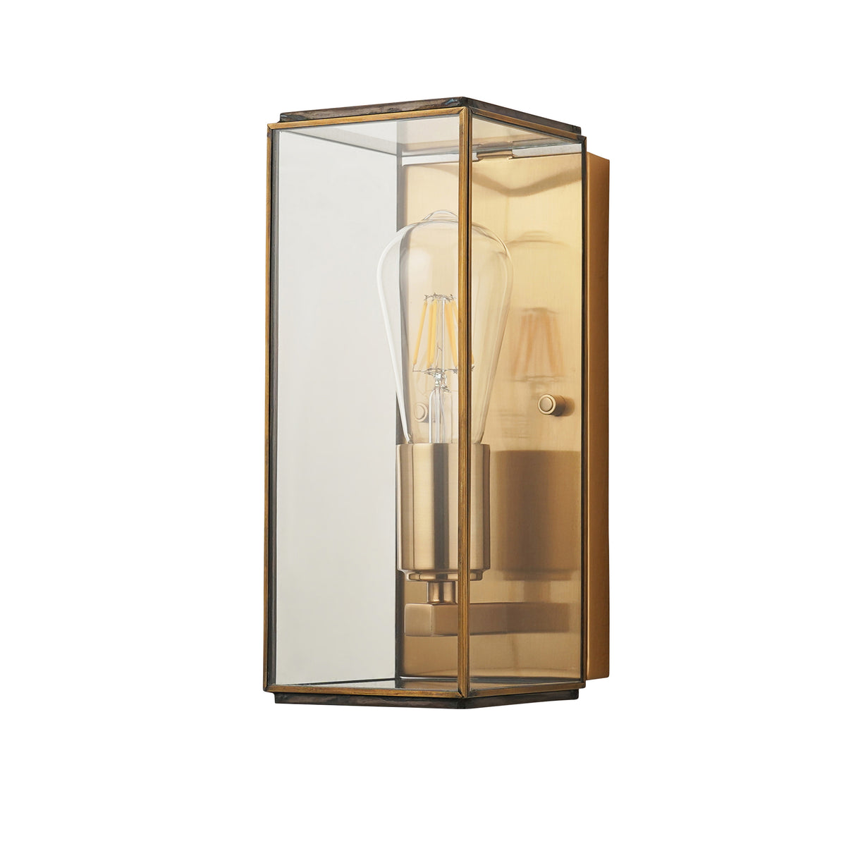 Rectangular brass wall sconce with clear glass panels and an exposed filament bulb.