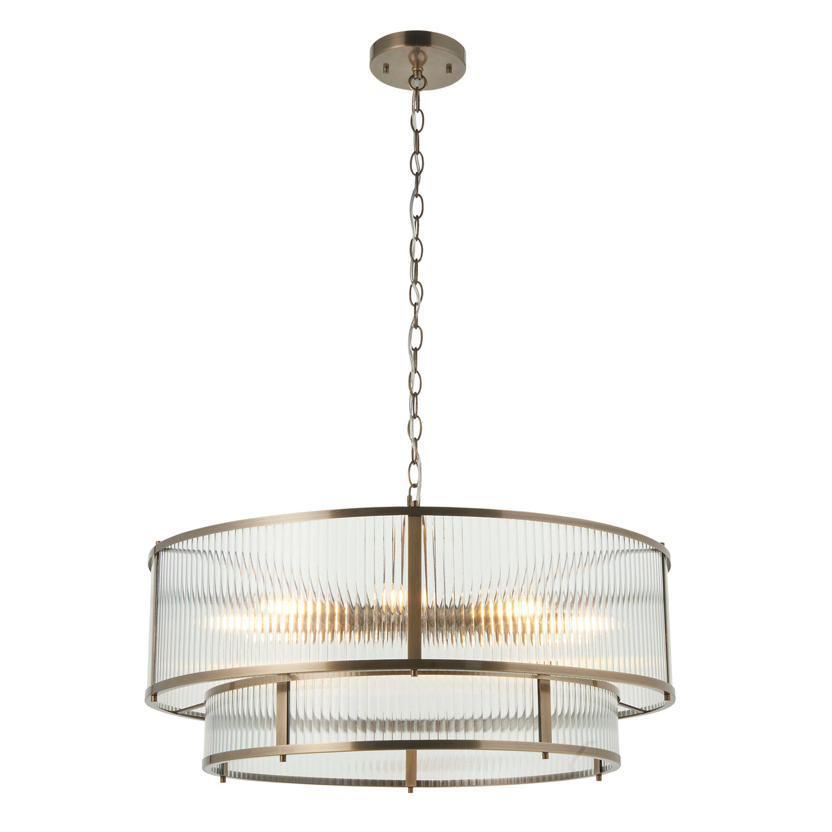 Two-tiered chandelier with fluted glass shades and an antique brass finish, hanging from a chain.
