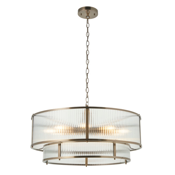 Two-tiered chandelier with fluted glass shades and an antique brass finish, hanging from a chain.