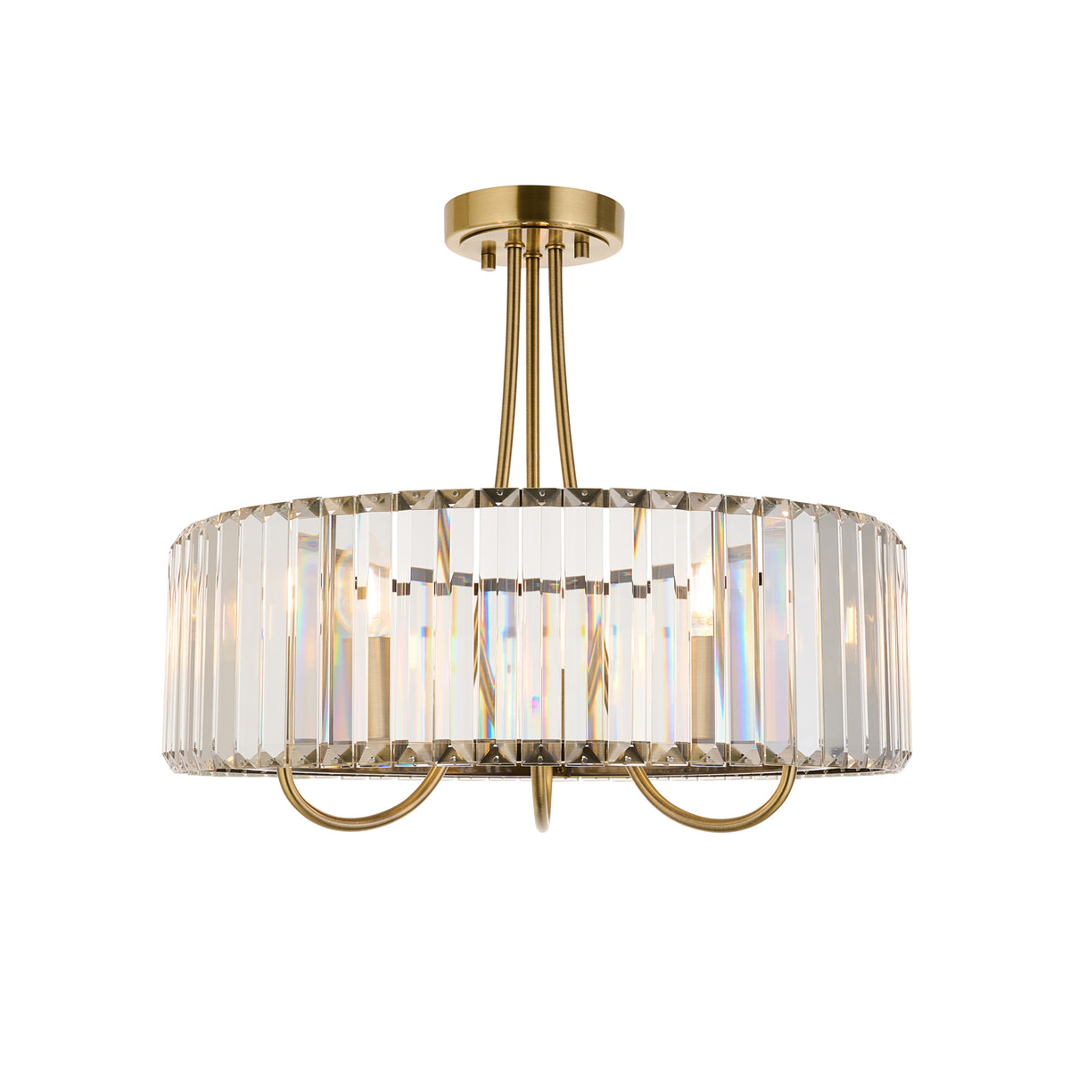 Round brass chandelier with vertical clear crystal panels, casting rainbow reflections.