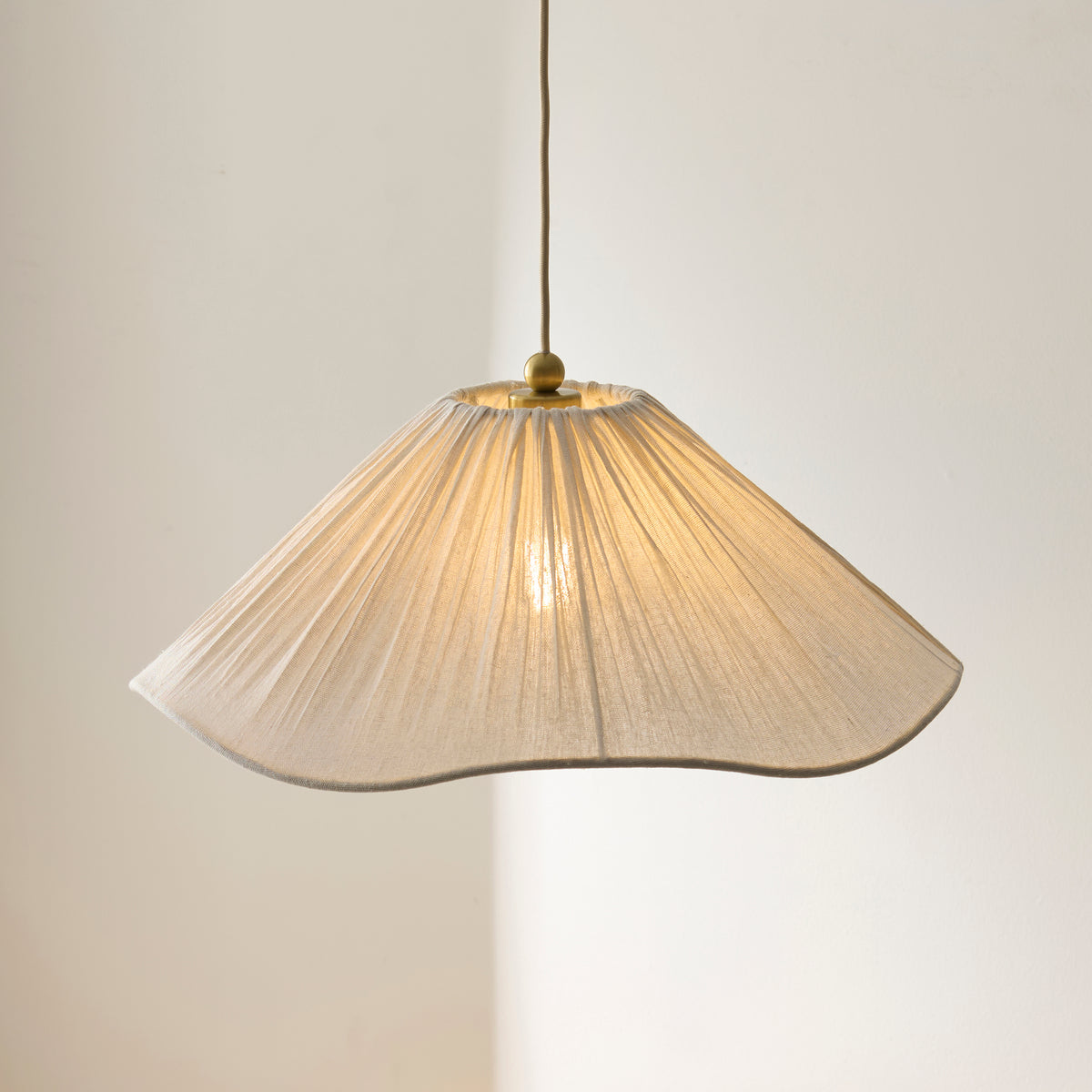 Isabella Pendant in Brushed Aged Brass with Flowing Vintage White Fabric Shade