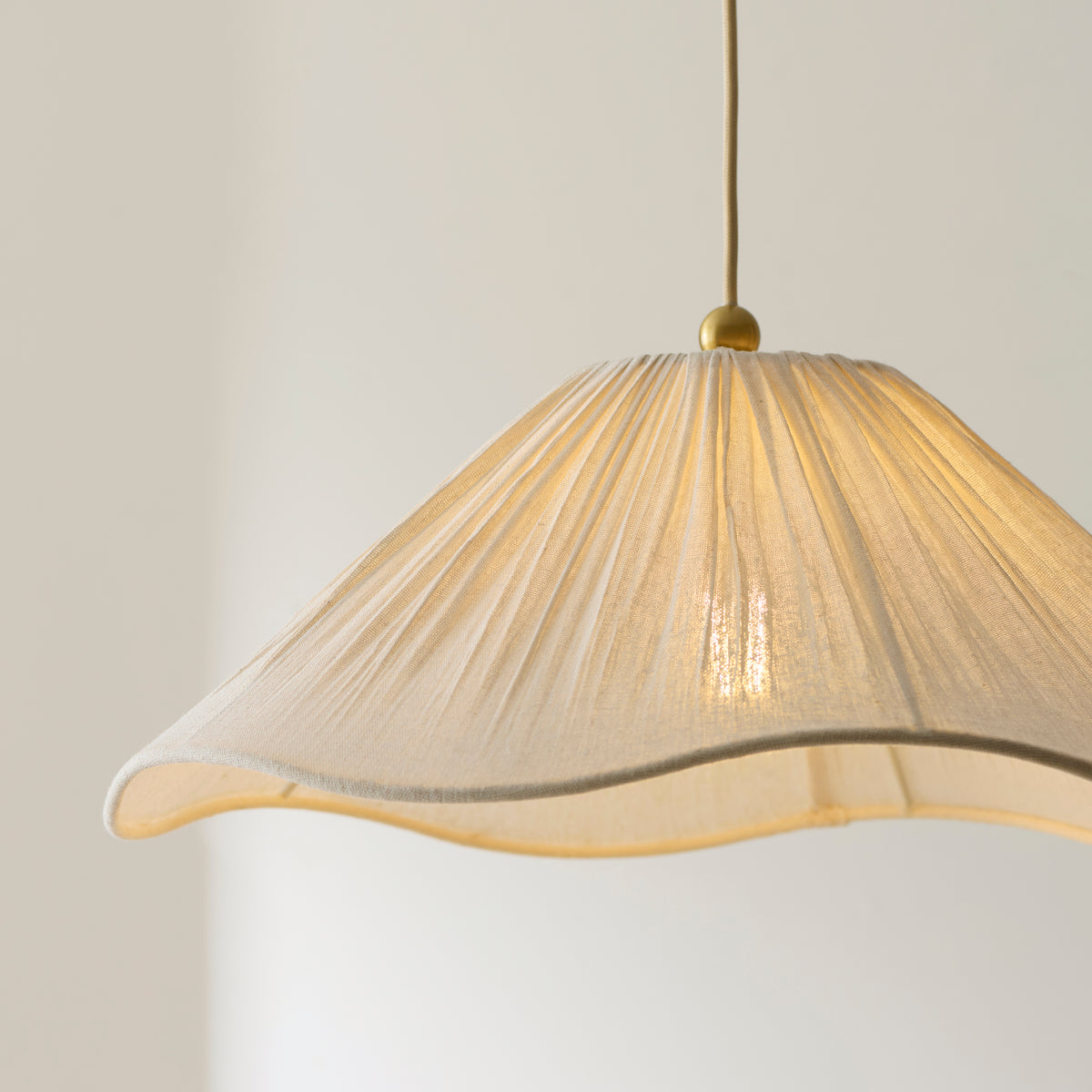 Isabella Pendant in Brushed Aged Brass with Flowing Vintage White Fabric Shade