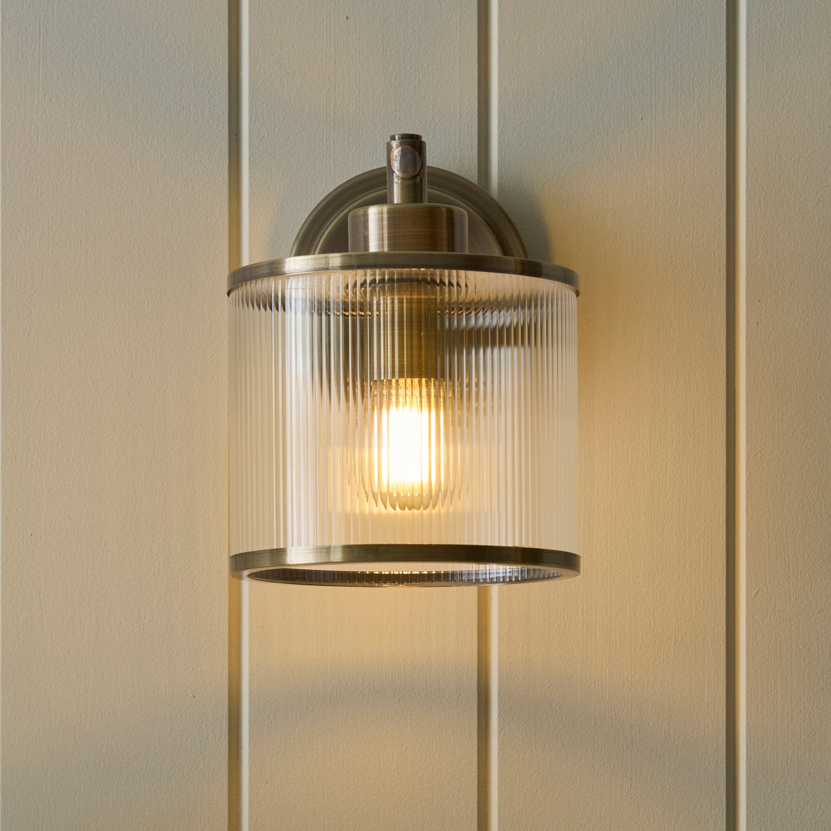 Ridgeton Single Arm Wall Light in Antique Brass & Clear Ribbed Glass