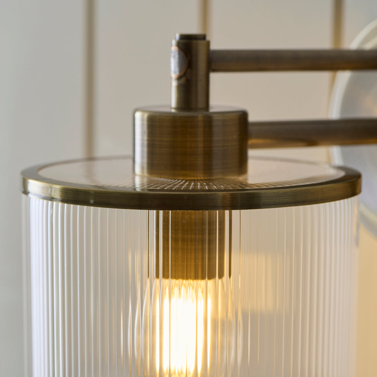 Ridgeton Single Arm Wall Light in Antique Brass & Clear Ribbed Glass