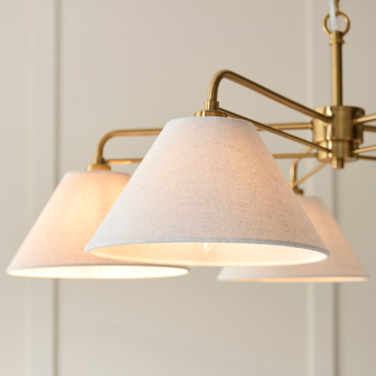 Wallbridge Five Arm Pendant in Brushed Aged Brass with Natural Linen Shades