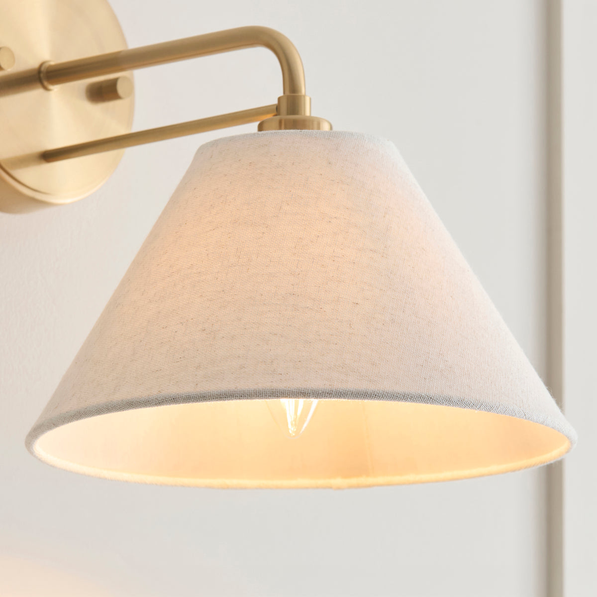 Wallbridge Wall Light in Brushed Aged Brass with Natural Linen Shade