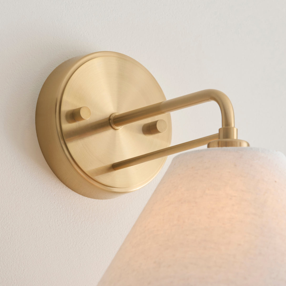 Wallbridge Wall Light in Brushed Aged Brass with Natural Linen Shade