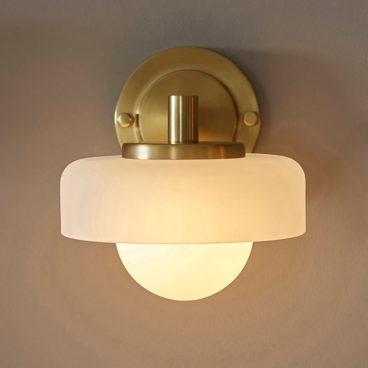 Endon Lighting Boss wall light in brushed aged brass with a matt opal sphere glass shade