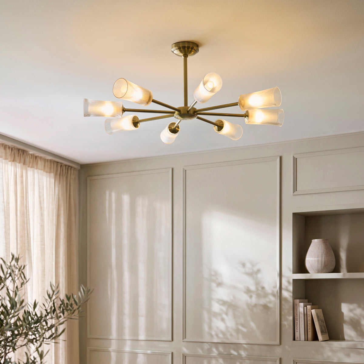 Avelyn Eight Arm Pendant in Antique Brass & Frosted Glass Diffusers