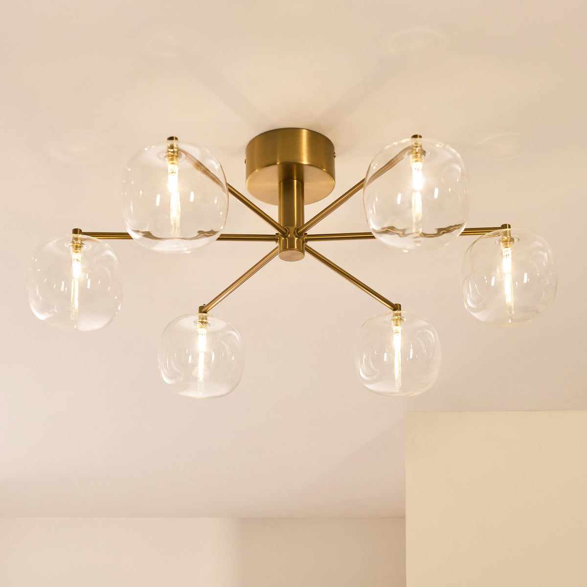 Oslo Six Arm Semi Flush Ceiling Light in Brushed Aged Brass with Clear Glass Shades