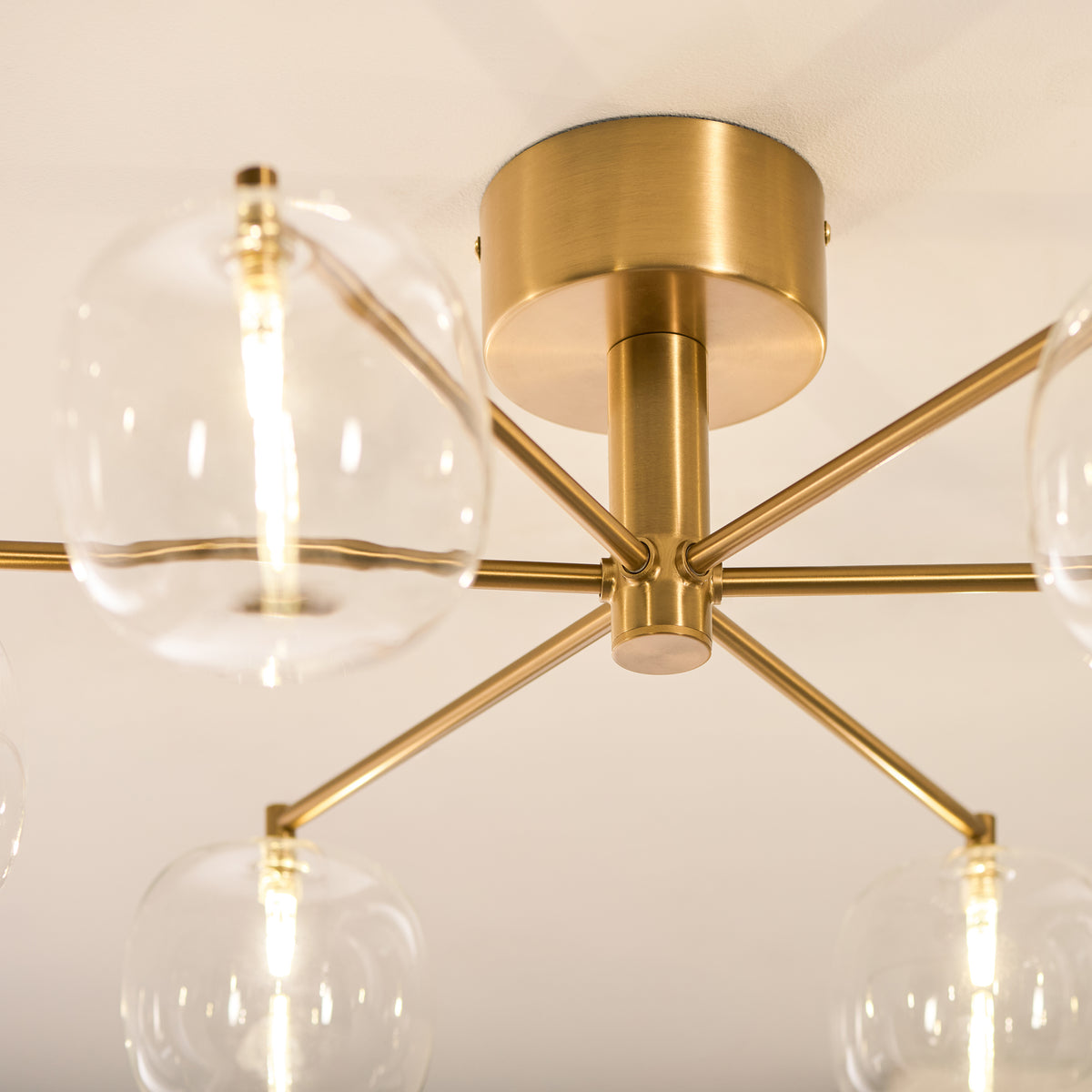 Oslo Six Arm Semi Flush Ceiling Light in Brushed Aged Brass with Clear Glass Shades