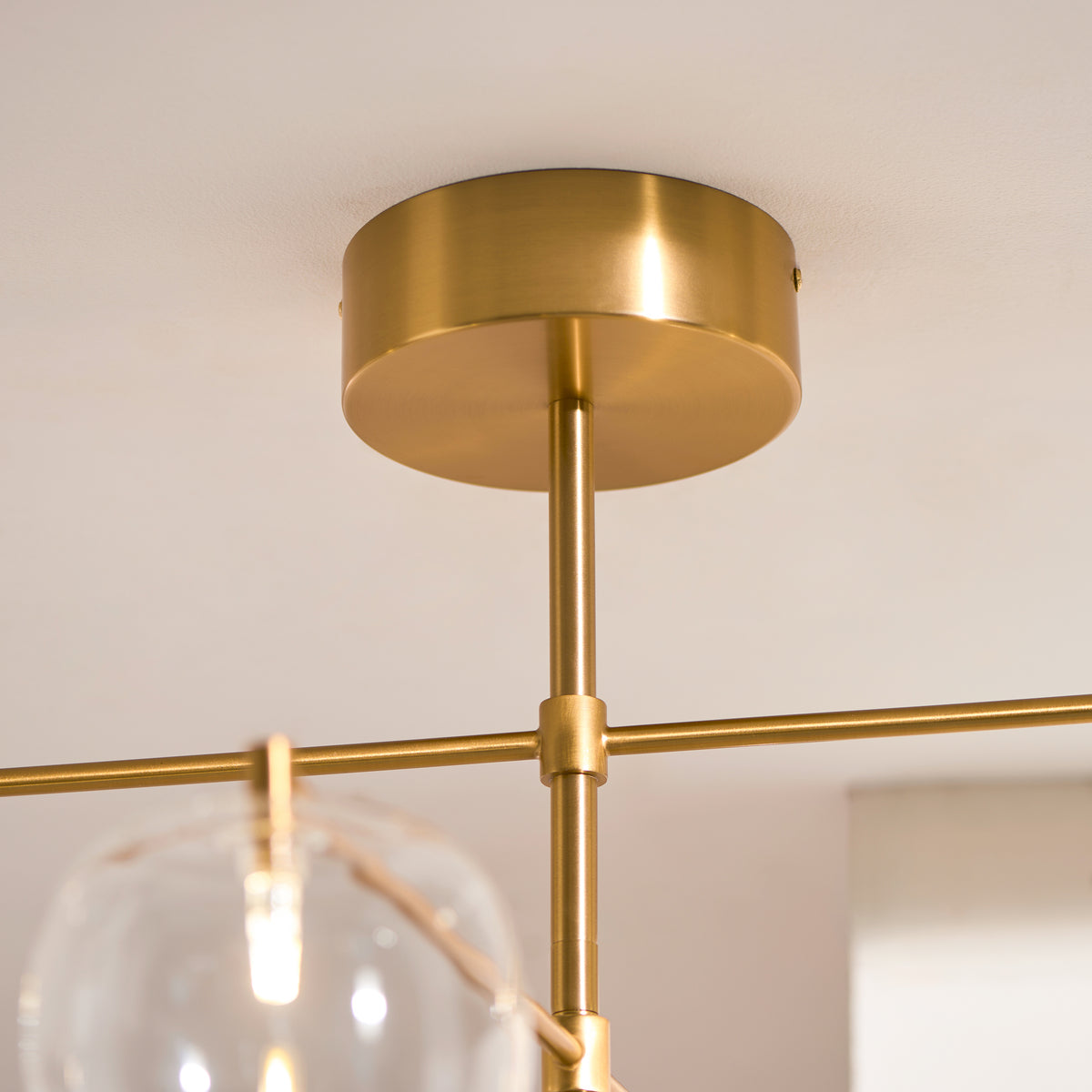 Oslo Six Light Pendant in Brushed Aged Brass with Clear Glass Shades