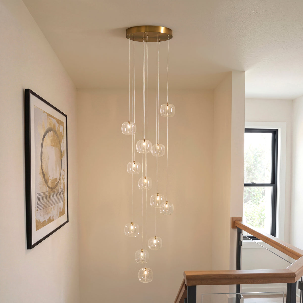 Oslo Twelve Light Cluster Pendant in Brushed Aged Brass with Clear Glass Shades