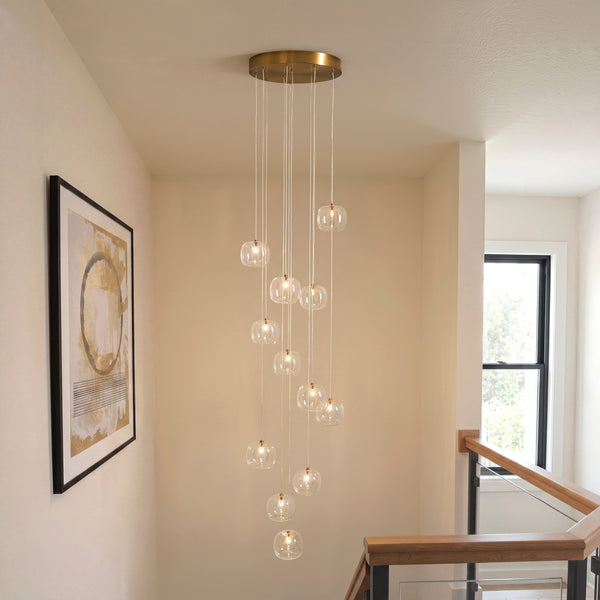 Oslo Twelve Light Cluster Pendant in Brushed Aged Brass with Clear Glass Shades