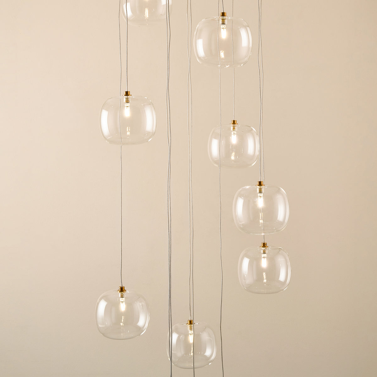 Oslo Twelve Light Cluster Pendant in Brushed Aged Brass with Clear Glass Shades