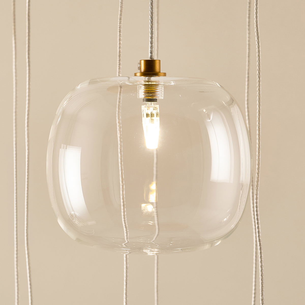 Oslo Twelve Light Cluster Pendant in Brushed Aged Brass with Clear Glass Shades