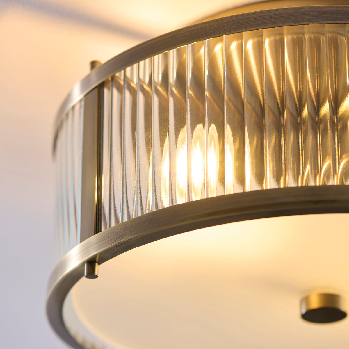 Ridgeton IP44 Flush Ceiling Light in Antique Brass with Clear Ribbed Glass & Frosted Diffuser