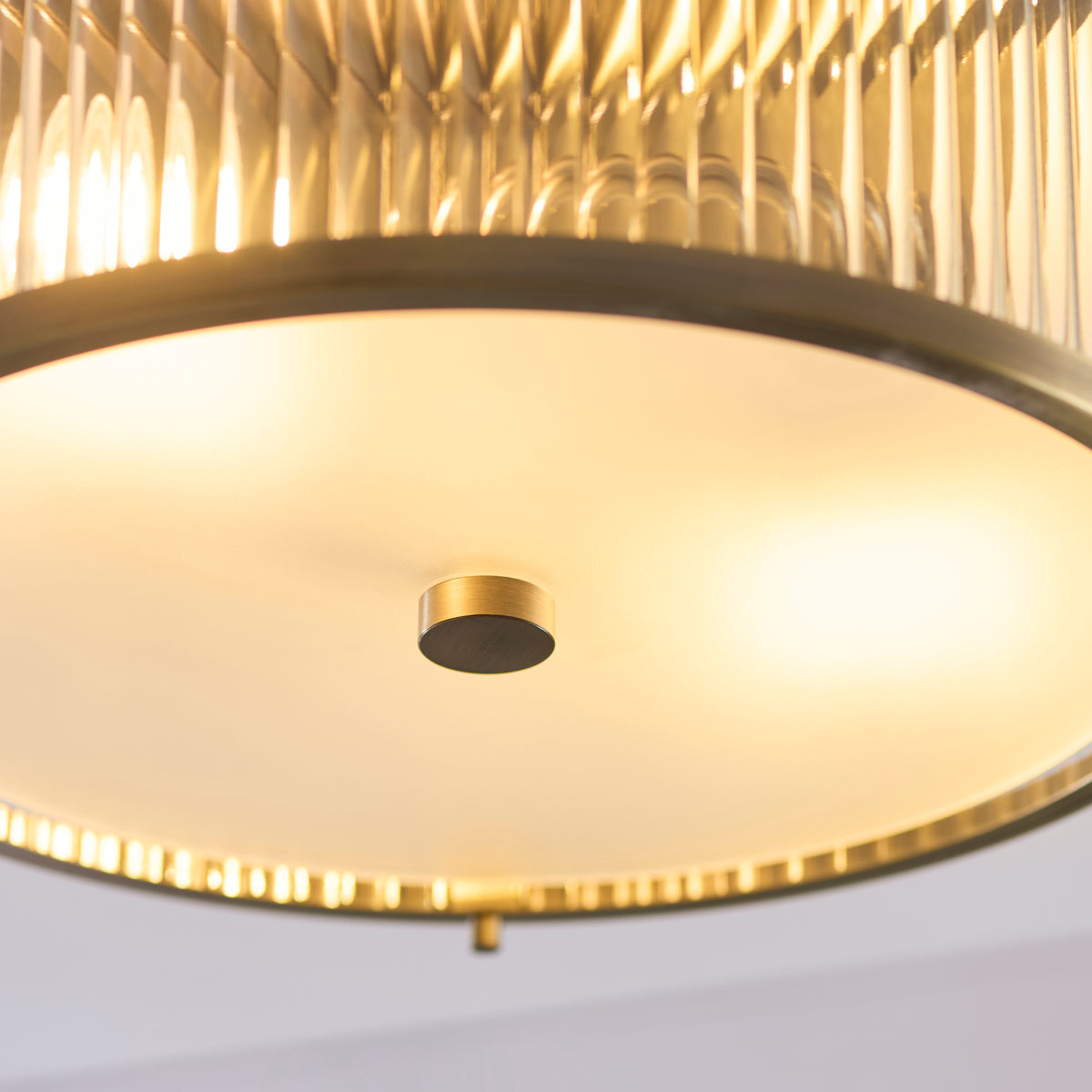Ridgeton IP44 Flush Ceiling Light in Antique Brass with Clear Ribbed Glass & Frosted Diffuser